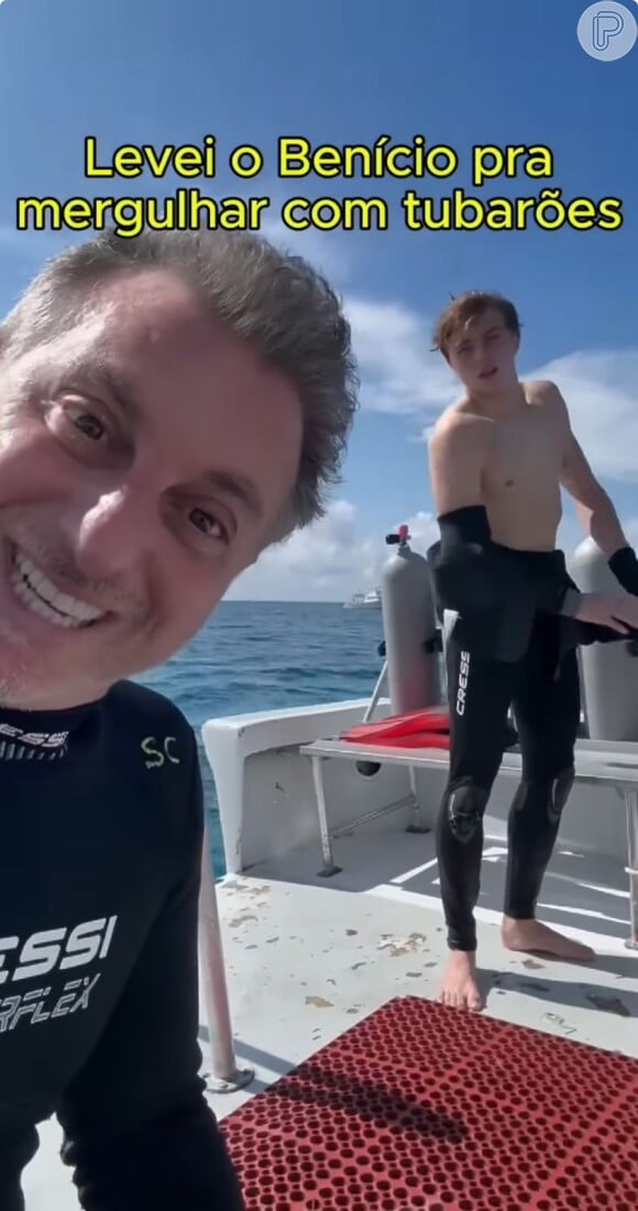 Luciano Huck e Benício juntos, antes de pular no mar com tubarões