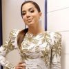 Para gravar o especial de fim de ano do 'Caldeirão do Huck', Anitta escolheu um vestido branco e dourado da grife Zuhair Murad que é avaliado em R$ 30 mil