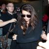 Kim Kardashian chega de sua última viagem da gravidez