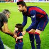 Milan, filho mais velho e Shakira e Gerard Piqué, entrou com o pai no campo e fez um gol após a partida