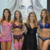 Giovanna Ewbank posa ao lado de modelos com lingerie