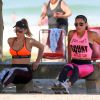 Exibindo boa forma e vestindo look de academia, Danielle Winits se exercitou na praia da Barra da Tijuca, Zona oeste do Rio de Janeiro, neste domingo, 12 de junho de 2015, ao lado de sua personal