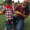 Juliana publicou foto do filho Antonio com o avô Carlos Henrique em outro evento junino