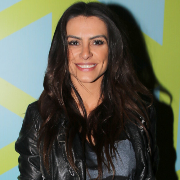Cleo Pires é vista aos beijos com o modelo Leandro de Lucca no Lollapalooza