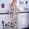 Nicole Kidman usou um vestido com bordado que formavam imagens de plantas e animais na 52ª edição do Country Music Awards, realizada no Toshiba Plaza, em Las Vegas, neste domingo, 2 de abril de 2017