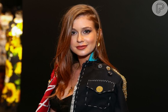 Marina também usou uma jaqueta da grife durante o evento na loja da Dolce & Gabbana, em São Paulo, na noite desta terça-feira, 25 de abril de 2017
