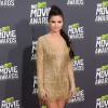 Selena Gomez escolheu um vestido curtindo com franças da grife Julien Macdonald para o MTV Movie Awards 2013