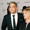 Robbie Williams avisa aos fãs que vai ser pai pela segunda vez: 'Estamos felizes'