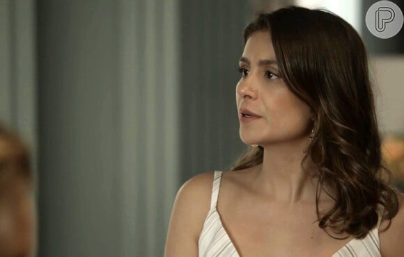 Tônia (Patrícia Elizardo) tenta disfarçar a visita de Zé Victor (Rafael Losso), na novela 'O Outro Lado do Paraíso'