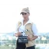 Anitta chegou ao bloco vestida como diretora dos seus clipes