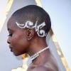 Danai Gurira usa joias Messika e tem corte de cabelo inspirado na cultura africana feito por Vernon Scott na 90ª edição do Oscar, realizada no Teatro Dolby, em Los Angeles, na Califórnia, na noite deste domingo, 4 de março de 2018