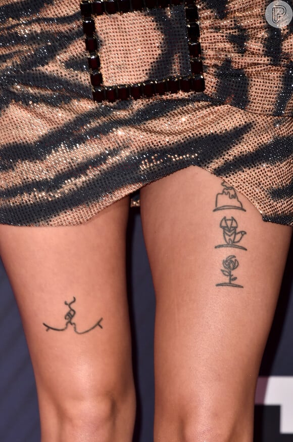 O look curto de Halsey evidenciou as tatuagens da cantora no iHeartRadio Music Awards, realizado no The Forum, em Inglewood, na Califórnia, neste domingo, 11 de março de 2018