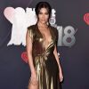 Chantel Jeffries elegeu o dourado com um vestido com fenda no iHeartRadio Music Awards, realizado no The Forum, em Inglewood, na Califórnia, neste domingo, 11 de março de 2018