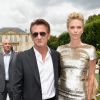 Charlize Theron e Sean Penn estiveram no desfile da grife Christian Dior, em Paris, no Museu Rodin, nesta segunda-feira, 7 de julho de 2014