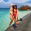 Juliana Paes combina cores neutras e vibrantes durante os dias de férias nas Maldivas, como conta stylist em entrevista ao Purepeople nesta quarta-feira, dia 16 de maio de 2018