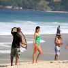 Isabelli Fontana exibiu a ótima forma durante o ensaio fotográfico realizado na praia de Ipanema na tarde desta quarta-feira, 30 de julho de 2014