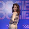 Maria João escolheu um vestido com estampa em degradê em linhas horizontais para a festa de lançamento da novela 'Boogie Oogie'