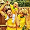 Família unida: Carol Trentini ao lado do marido, Fabio Bartelt, e do filho, Bento, em clima de torcida durante os jogos da Copa do Mundo