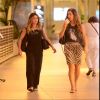Giovanna Antonelli caminha com amiga em shopping