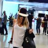 Danielle Winits embarcou no aeroporto Santos Dumont, no Rio de Janeiro, na manhã desta quarta-feira, 24 de setembro de 2014. Usando um look todo preto e branco, a atriz esbanjou estilo de óculos escuros e com um chapéu bicolor