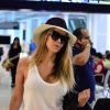 Danielle Winits embarcou no aeroporto Santos Dumont, no Rio de Janeiro, na manhã desta quarta-feira, 24 de setembro de 2014