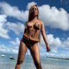 Anitta surge só de tapa-sexo em clipe 'Bola Rebola'