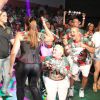 Susana Vieira e David Brazil agitam a bateria da Grande Rio durante coroação