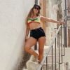Anitta aliou biquíni do 'reggae' com short jeans e acessórios trends