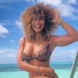  Moda praia de Juliana Paes: atriz usa biquíni  com estampa de oncinha  