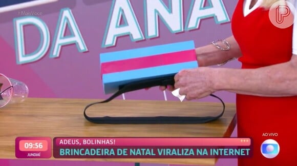 Ana Maria Braga colocou a caixa com as bolinhas na cintura, por meio de um cinto feito em velcro