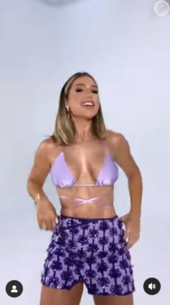 Virgínia Fonseca, nas redes sociais, passou a usar biquínis metalizados com saídas de praia combinando para fazer danças
