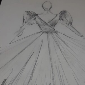 Osvaldo Arcas mostra o desenho inicial do vestido de Angélica