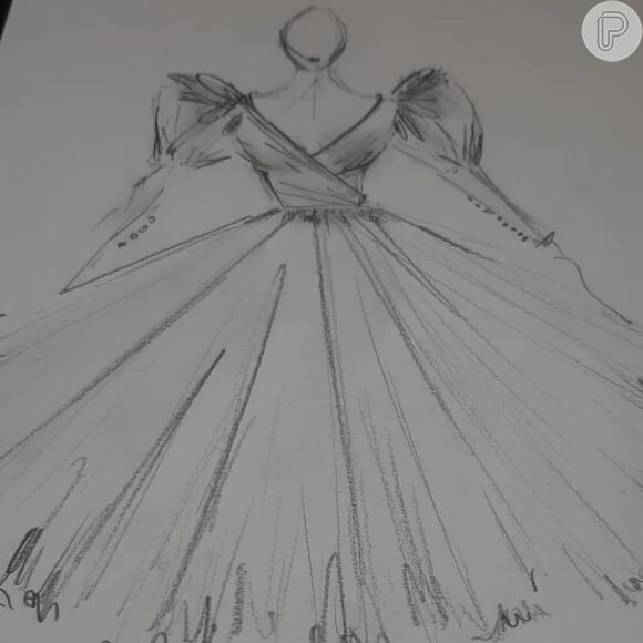 Osvaldo Arcas mostra o desenho inicial do vestido de Angélica