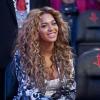Beyonce Knowles posa durante partida da NBA, em fevereiro de 2013