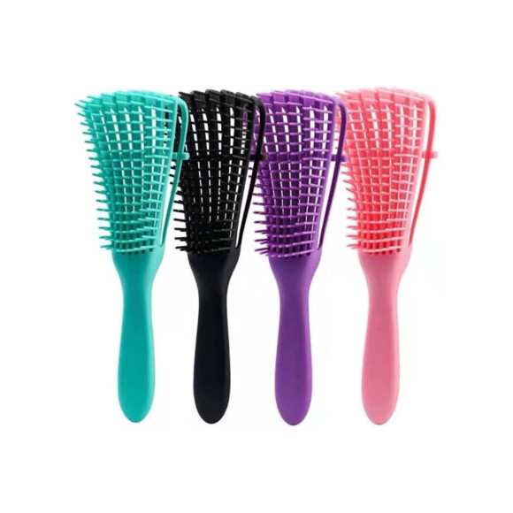 Escova polvo é perfeita para cabelos cacheados e crespos: esse modelo é da marca Marilu