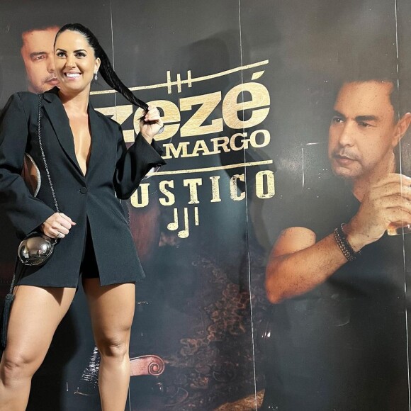Graciele Lacerda marcou presença no show de Zezé Di Camargo em um look preto com decote profundo