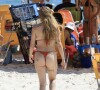 Anna Livya Padilha exibiu a barriguinha nesta quarta-feira, 18 de janeiro de 2023, na praia da Barra, no Rio
