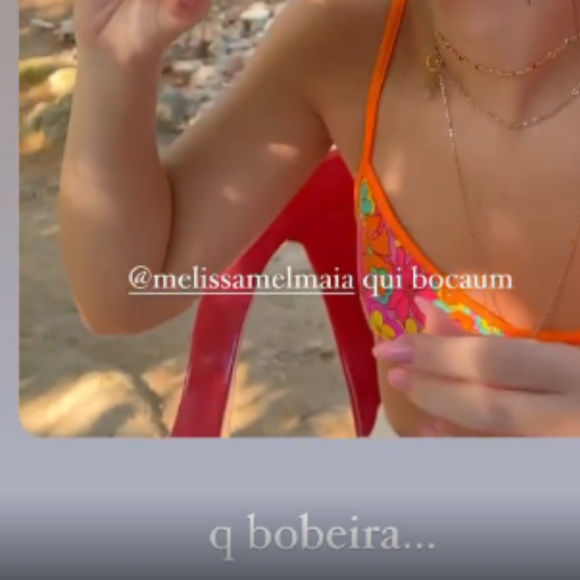 Mel Maia compartilhou o vídeo em que coloca um copo inteiro na boca e brincou: 'Que bobeira'