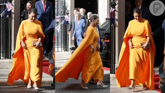 Janja escolhe vestido laranja com capa em evento com Lula na Inglaterra antes da coroação de Rei Charles III