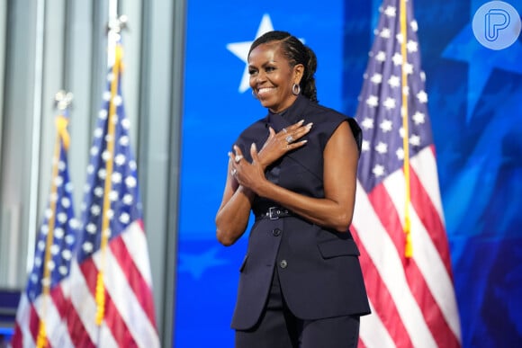 O colete usado por Michelle Obama custa em torno de R$ 9 mil.