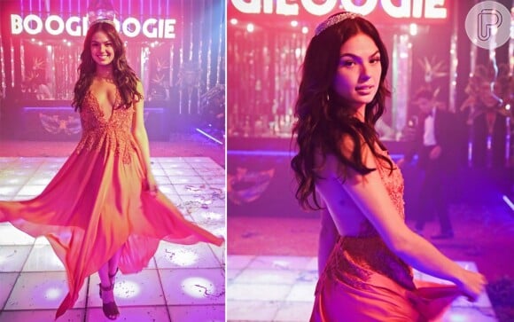 Vestida de princesa, Sandra (Isis Valverde) usa uma tiara bem conhecida por Carlota (Giulia Gam), no baile da discoteca, na novela 'Boogie Oogie'