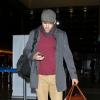 Ryan Reynolds desembarca no aeroporto de Los Angeles, nos Estados Unidos, em 29 de novembro de 2012