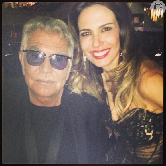 Luciana Gimenez posa com Roberto Cavalli durante festa no iate do estilista em Cannes, na França
