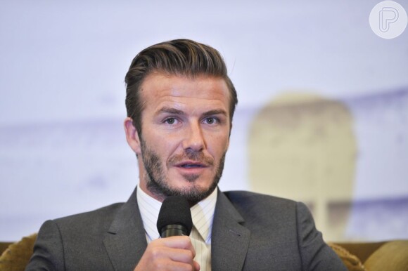 David Beckham está na China para promover um time de futebol e causou um tumulto no local do evento, em 20 de junho de 2013