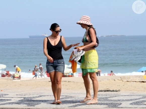 No começo da gestação, ainda com três meses de gravidez, ela caminhou pela orla carioca