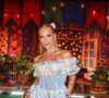 Virgínia Fonseca apostou em um vestido caipira com estampa xadrez, renda e botas over the knee para a festa julina na mansão de Vini Jr.