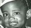 Kanye West foi criança sorridente na infância.