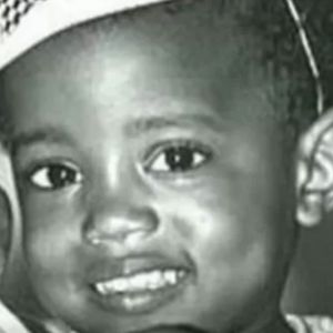 Kanye West foi criança sorridente na infância.