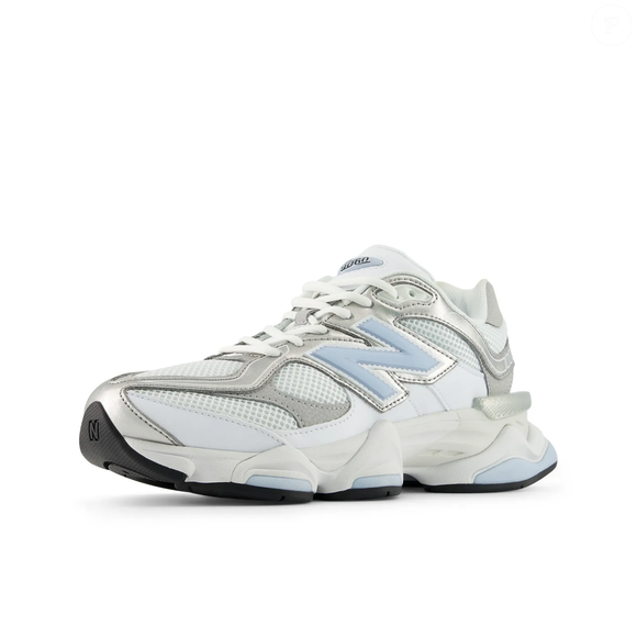 Para quem ama moda com toque romântico, o New Balance 9060 surge como uma opção que combina com saias, vestidos e produções no estilo preppy