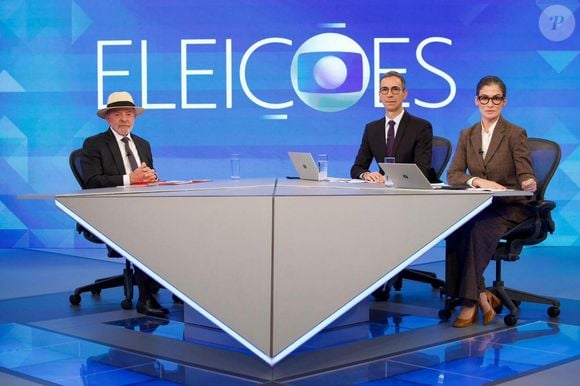 Globo queria equilíbrio entre Renata Vasconcellos e César Tralli nas entrevistas com os candidatos à Presidência - na foto, jornalistas com Lula (de chapéu)